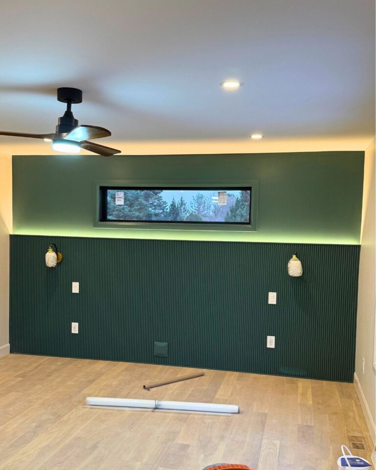Room with a ceiling fan, pot lights, LED accent lighting and new outlets